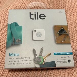 Tile Mate tracker - new in box, 150ft range, replaceable battery